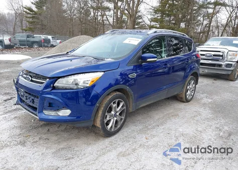 2014 Ford Escape Titanium z USA, uszkodzony, nr VIN 1FMCU9J97EUB26774